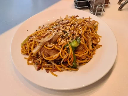 Wok- fried egg noodles with assorted meats